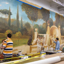 during mural restoration at Clemens Center