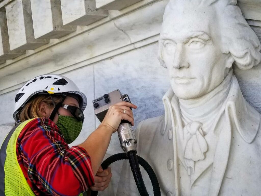 EverGreene conservator during laser cleaning at the Jefferson memorial.