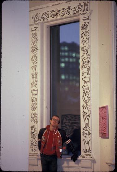 Keith Haring with December 1981 Window Artwork